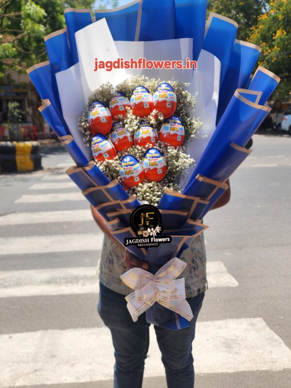 A big size Kinder joy with gypso  bouquet
