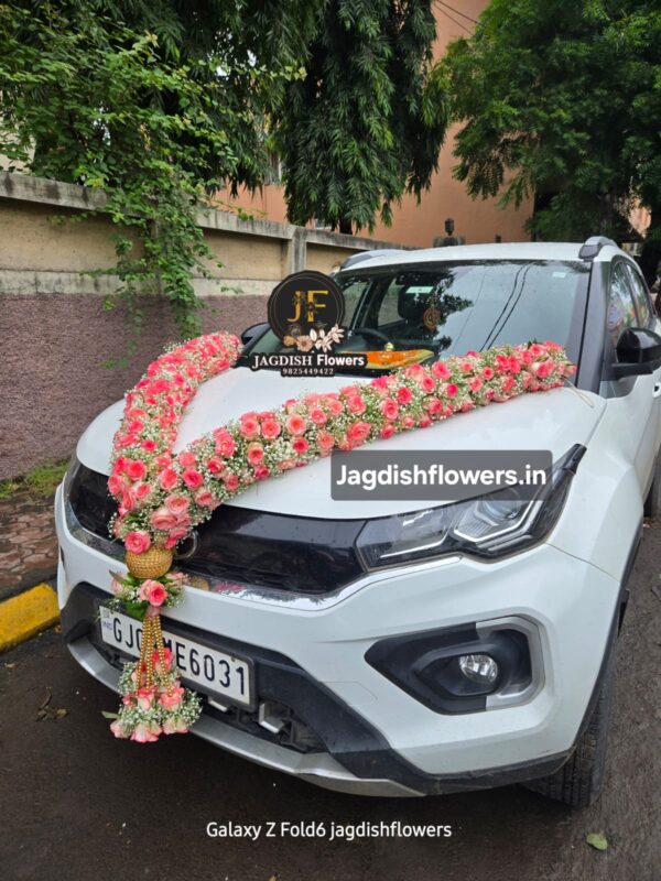 pink roses with gypso new car mala